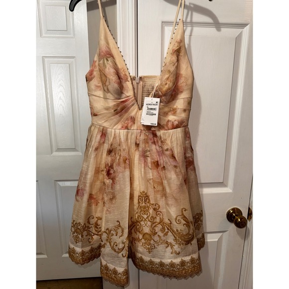 ZIMMERMANN
Hypnotic floral linen and silk minidress Size 4 - Picture 4 of 10